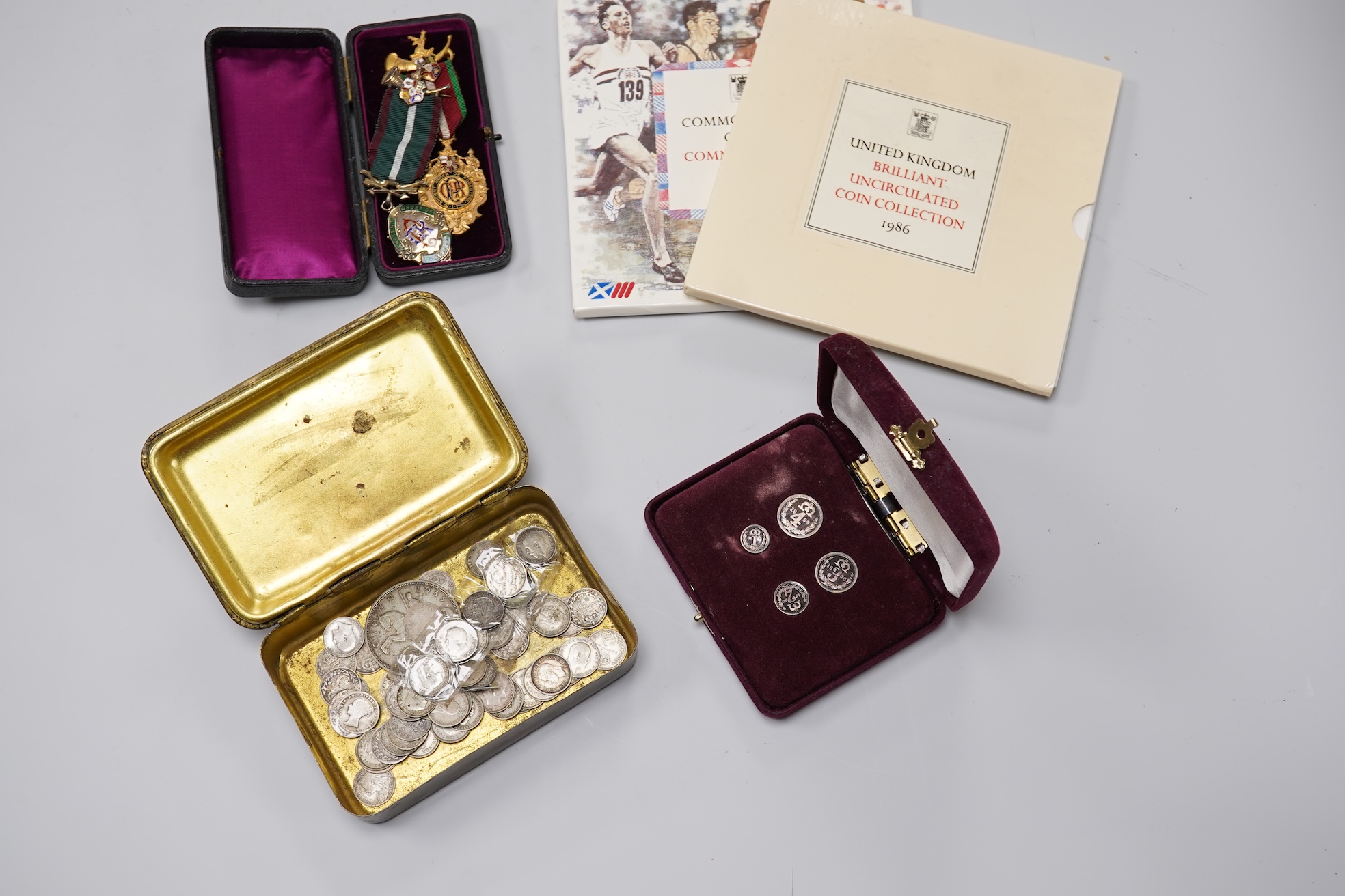 A small group of British coinage to include a 1936 Maundy set, together with two Foresters medals, one silver